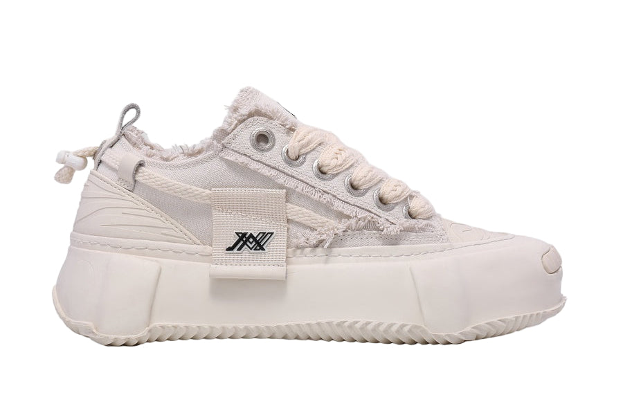 White sneaker with a brand logo on a white background